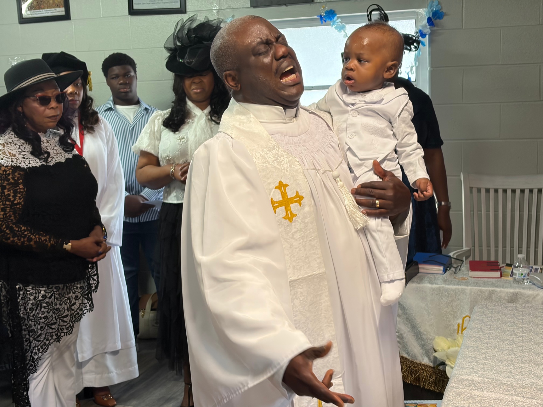 Prayer of blessing offered over the newly dedicated child