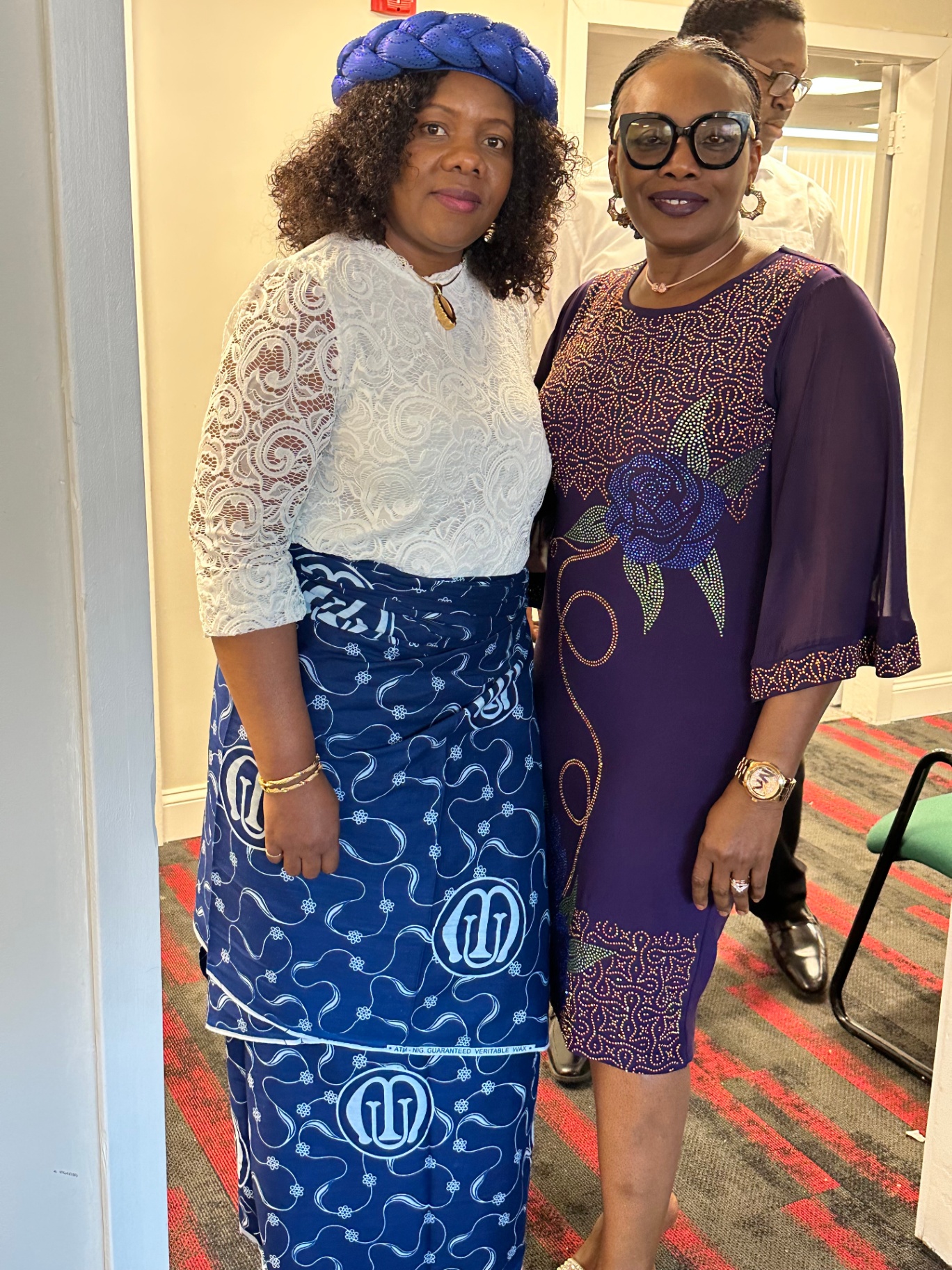 Two women in beautiful Igbo attire posing together during Mother's Sunday 2023