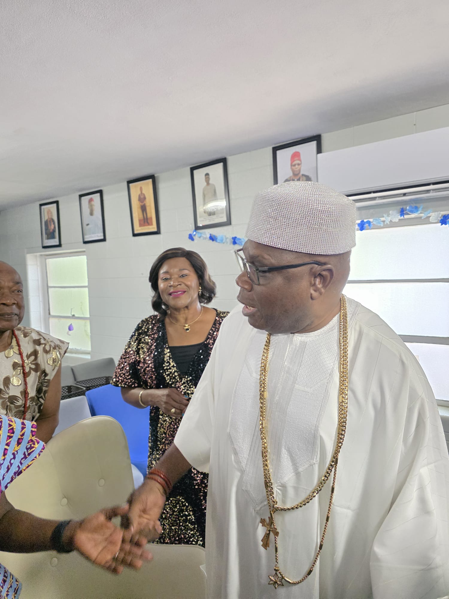 His Royal Majesty exchanges pleasantries with Ezeokpoko after the service