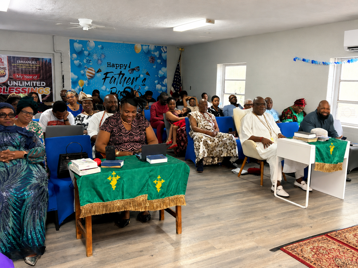 His Royal Majesty seated among the Emmanuel Anglican Church congregation