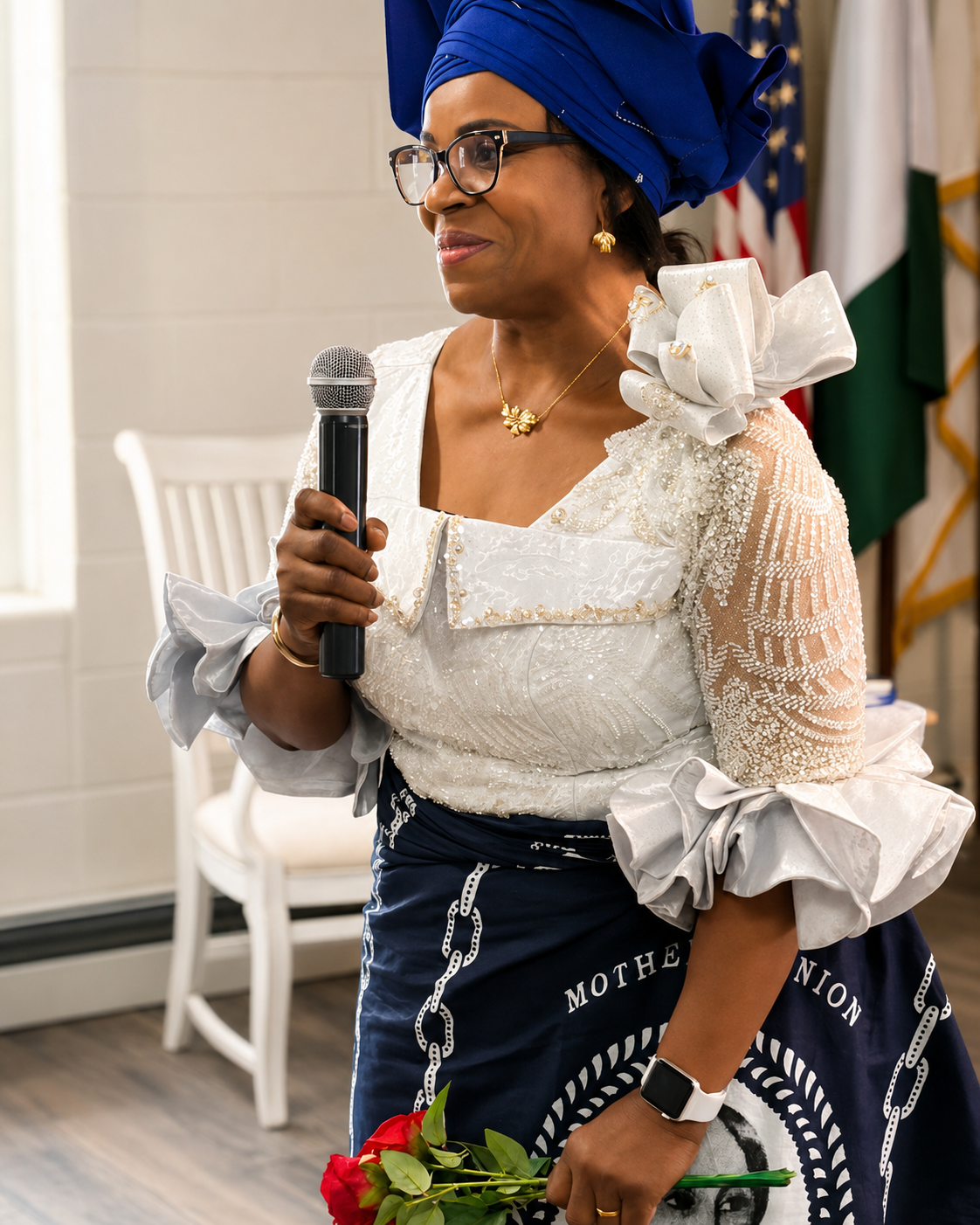A women's ministry leader speaking during the Mother's Sunday service