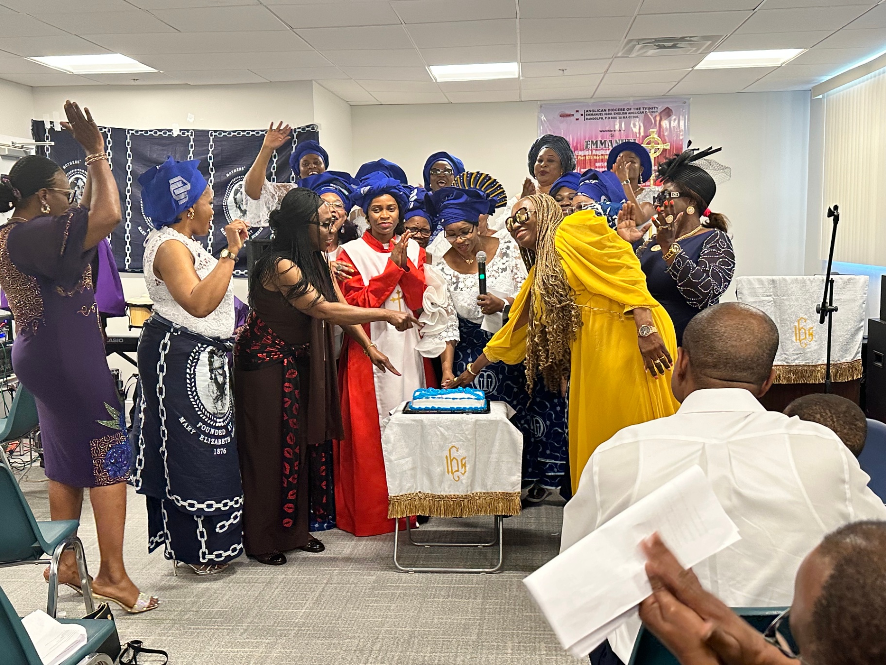 Mothers cutting the celebration cake
