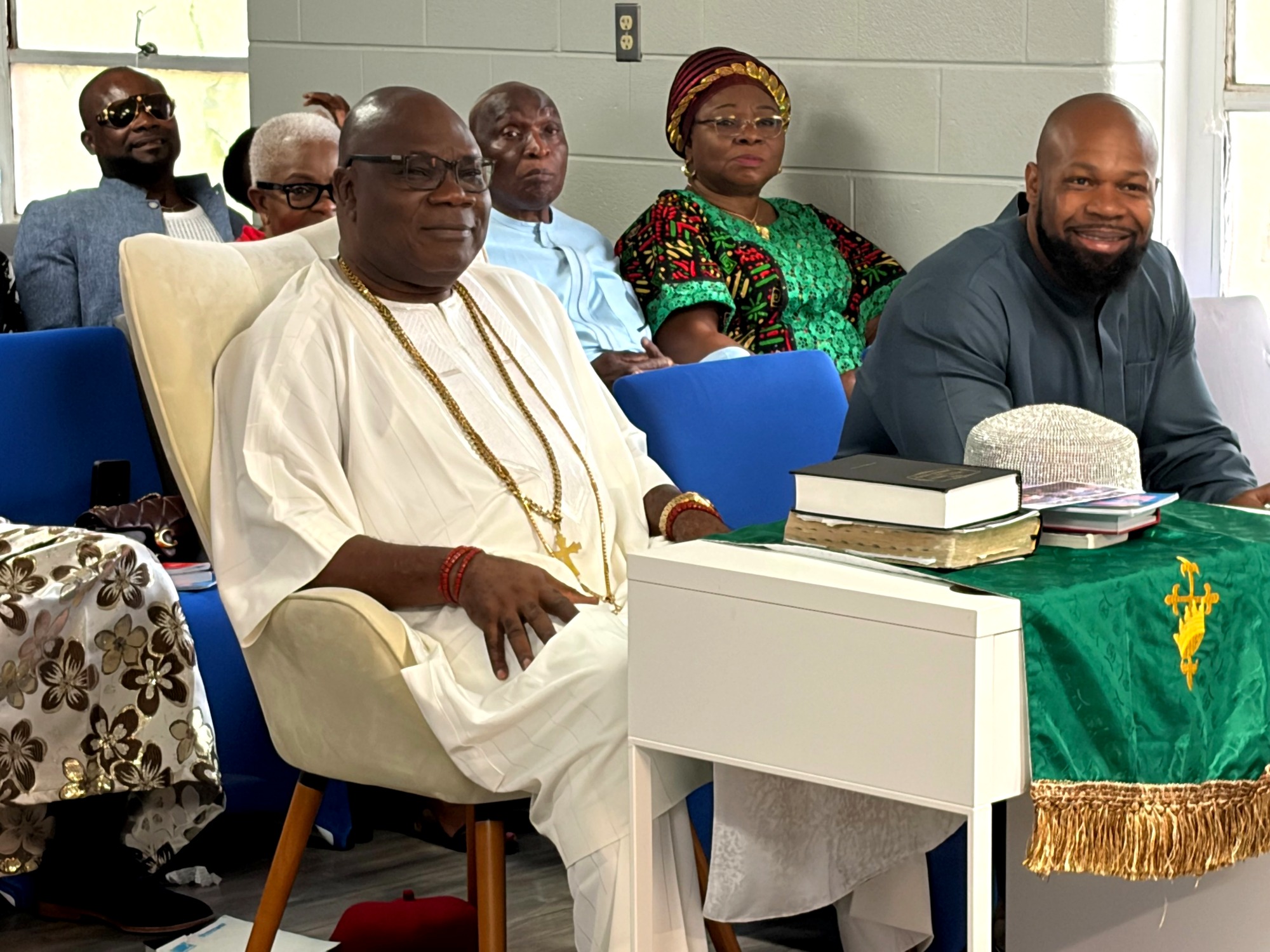 His Royal Majesty seated with Ezeikpoaku during the service, attentive to the Word